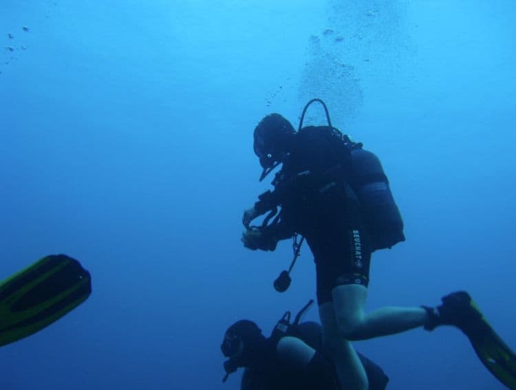 A diver heading down to a wreck in Malta