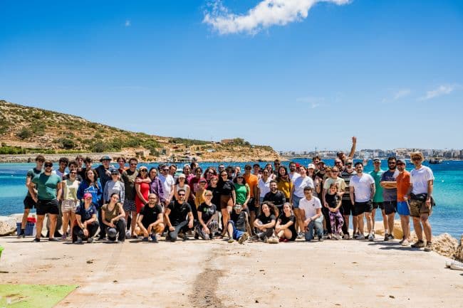 The full team of people cleaning up Malta in one of the Zibel events.