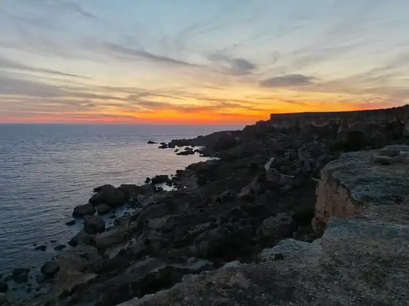 Limestone cliffs at sunset on Malta's northwest coast