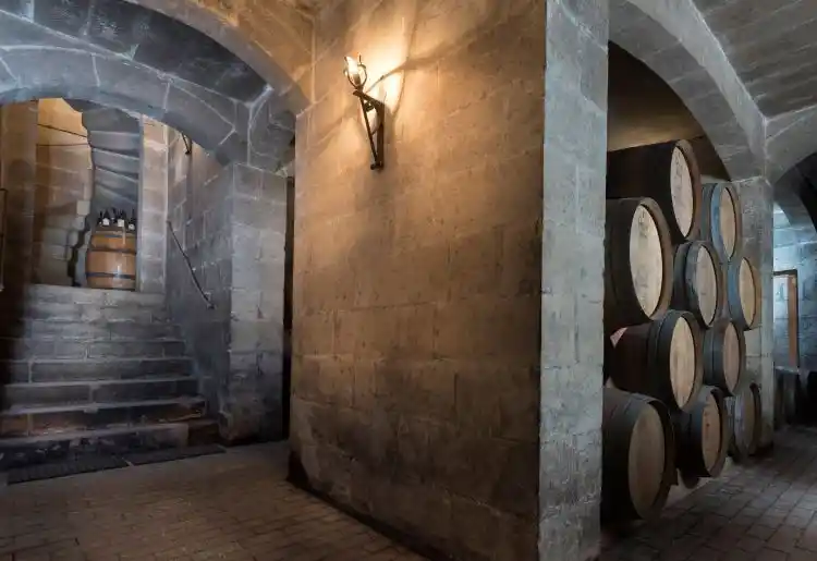 Underground barrel cellars at Meridiana Wine Estate in Ta' Qali, Malta, with oak barriques ageing wine