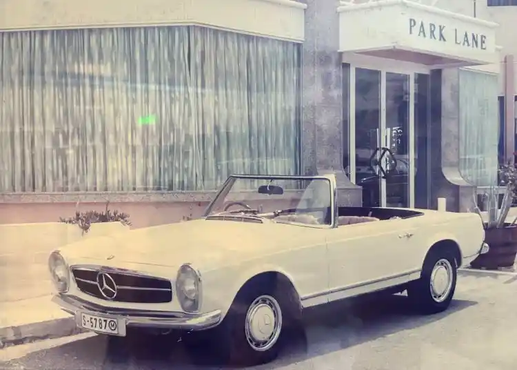 A classic Mercedes-Benz W113 “Pagoda” SL roadster, likely a mid-1960s 230 SL, photographed outside Park Lane in Malta.