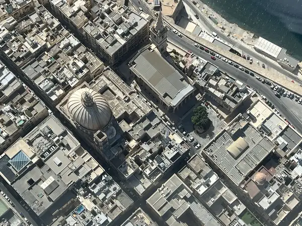 Valletta from above, with the dome of the Basilica of Our Lady of Mount Carmel in the centre of the city